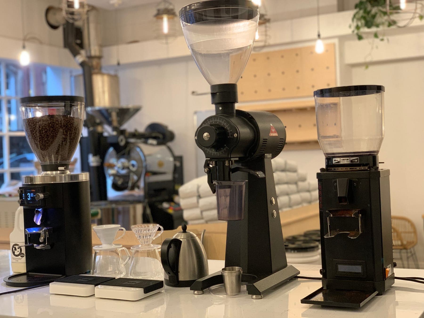 Grinders and brewing equipment on the brew bar at The Coffee Counter