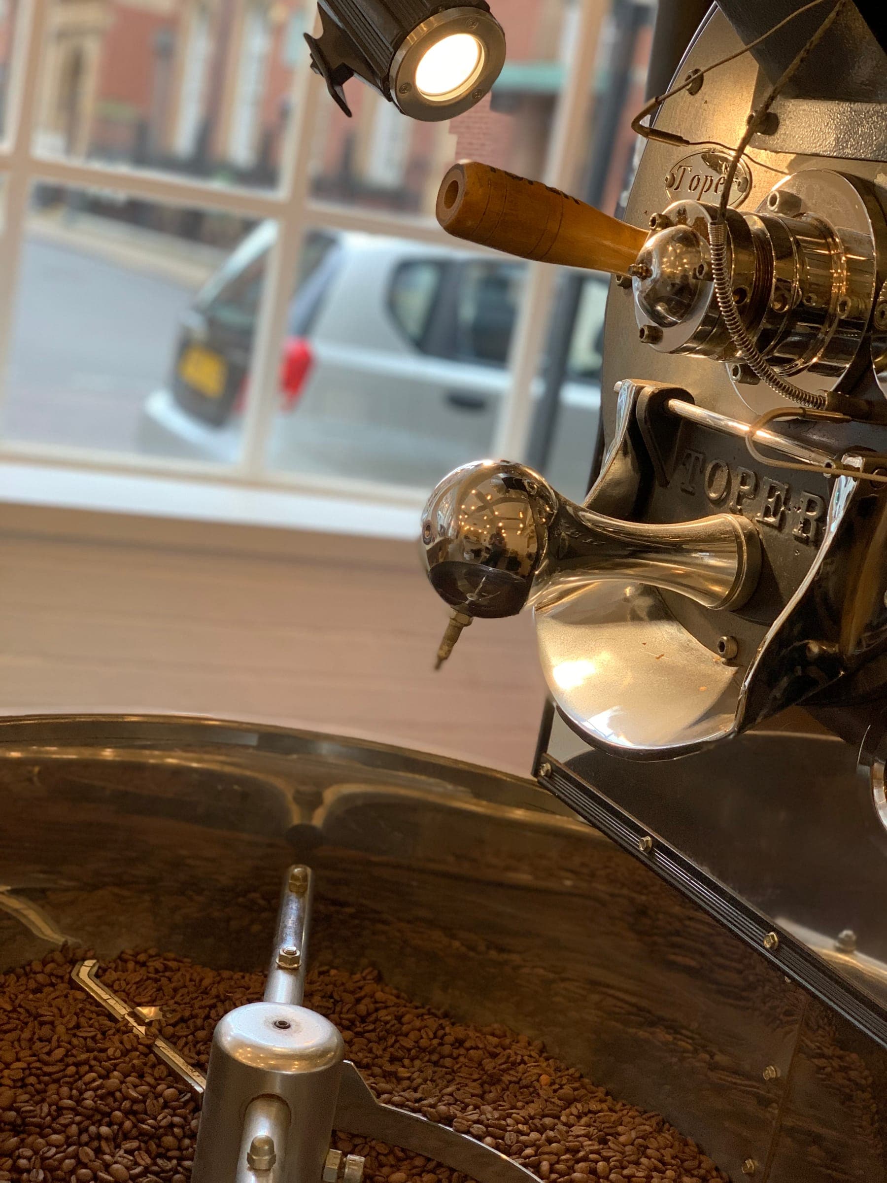 The coffee roaster at The Coffee Counter roastery in Leicester