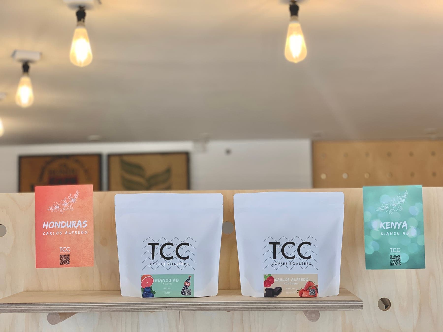 TCC coffee bags displayed on the shop shelf